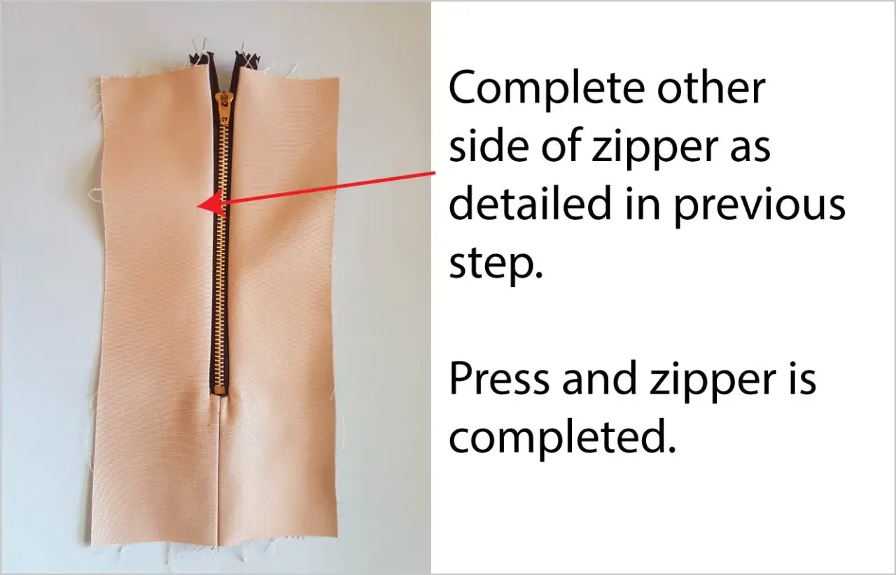 Sewing a garment, showing an exposed zipper on light-colored fabric. Instructions indicate to complete the other side of the zipper.