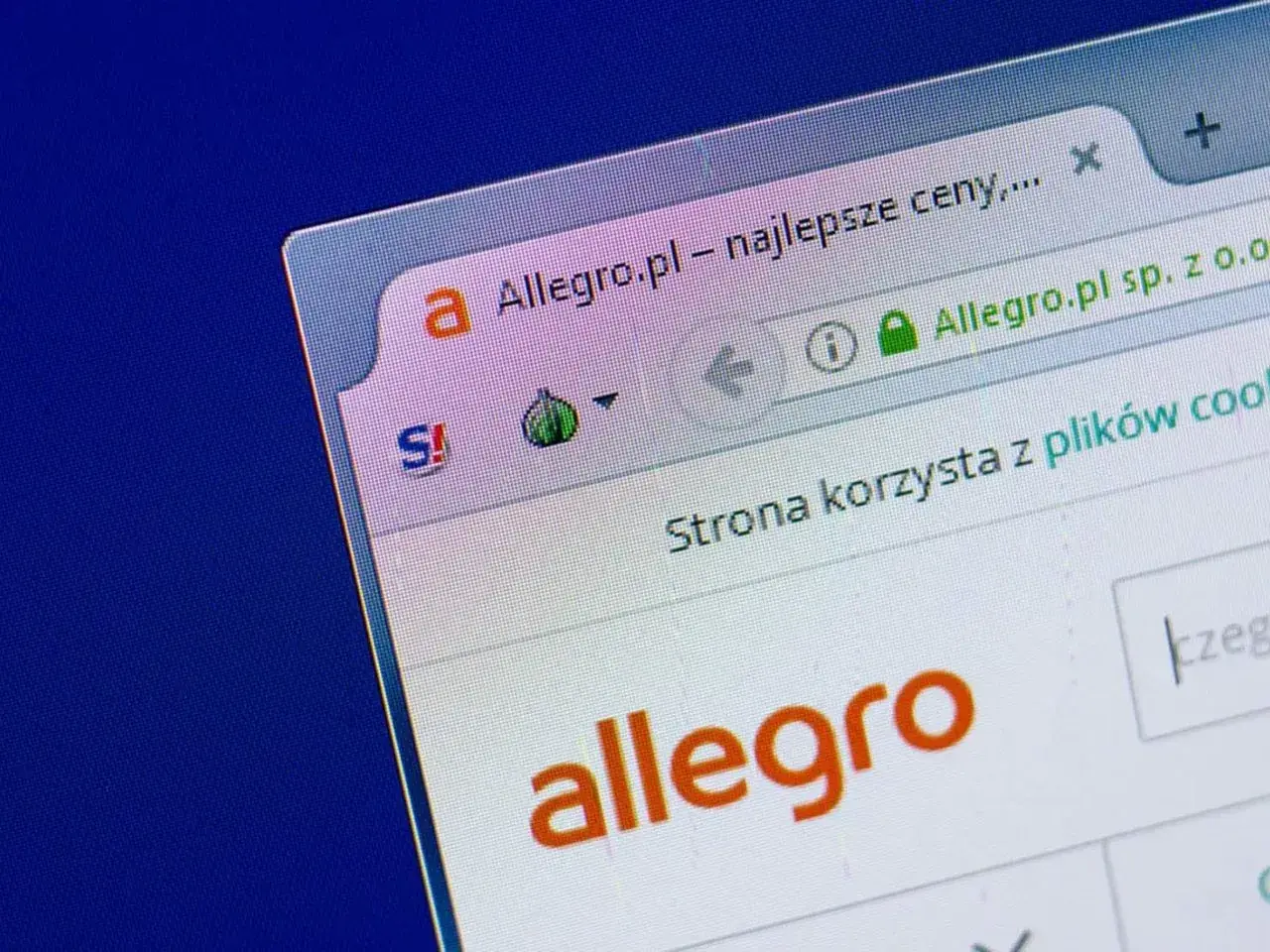 Ekran przeglądarki z widocznym logo Allegro i informacją o ochronie kupujących. Bezpieczne zakupy to podstawa!