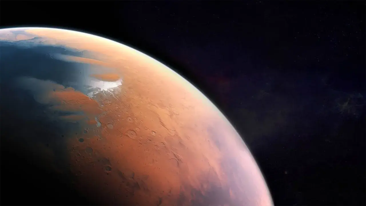 Czerwona planeta z lodowymi czapami. Chcesz wiedzieć, ile stopni jest na Marsie? To zimno, średnio -63°C.