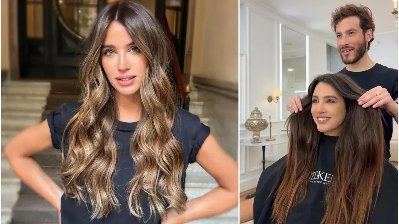 Cabello largo y ondulado con reflejos dorados, como besado por el sol. Un estilista ajusta su melena en un salón de belleza.