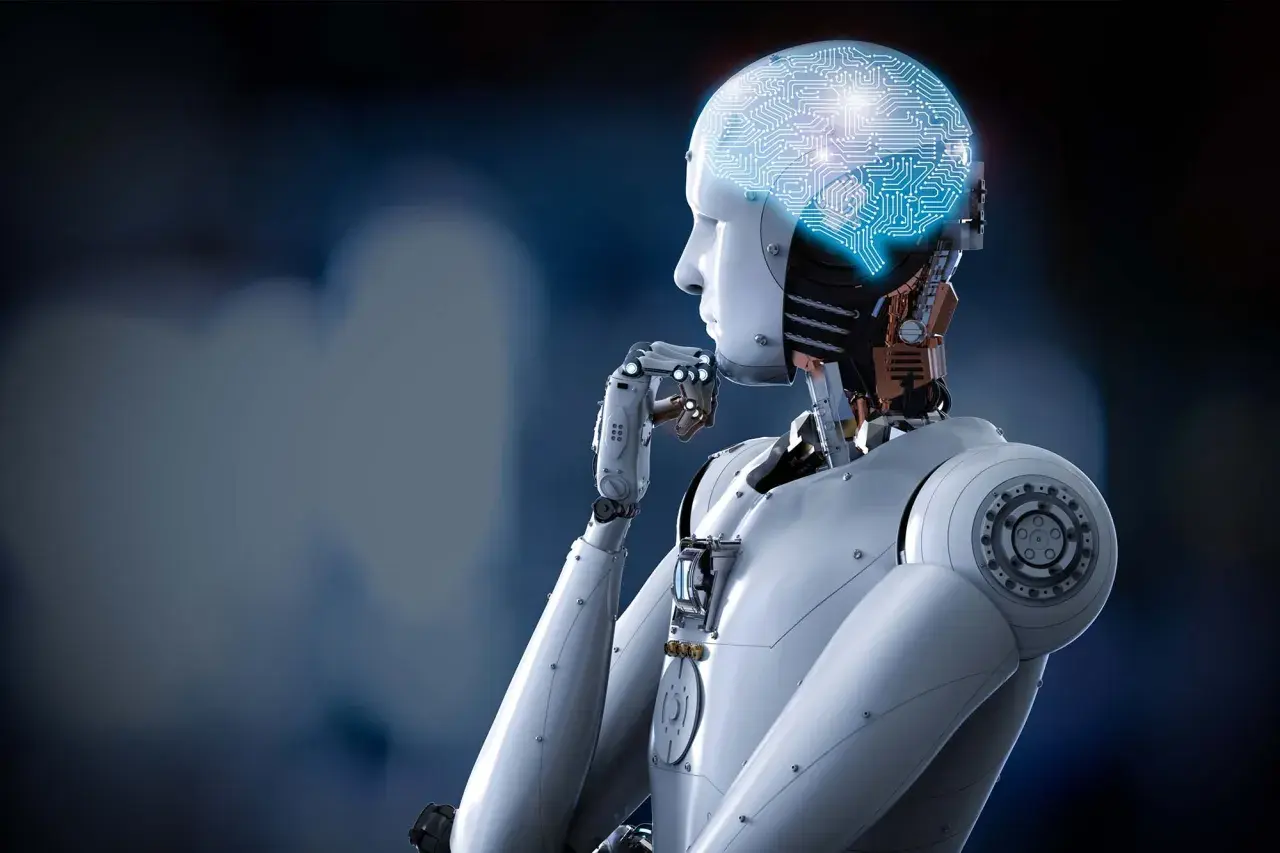 Robot z świecącym mózgiem w kształcie obwodów drukowanych, zastanawiający się nad tym, czym jest kognitywistyka.