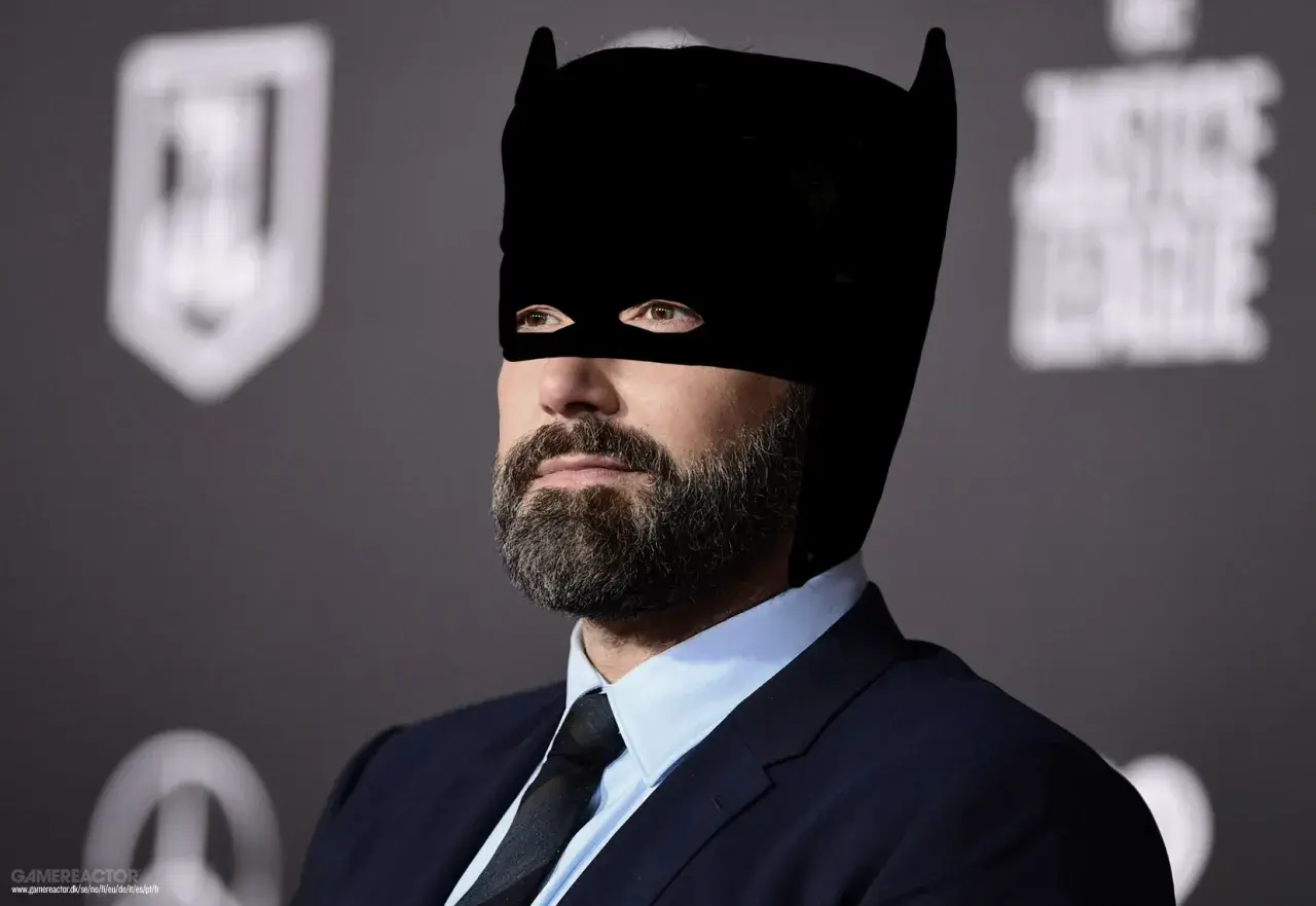 Ben Affleck, som spelar Batman, bär en svart mask och kostym.