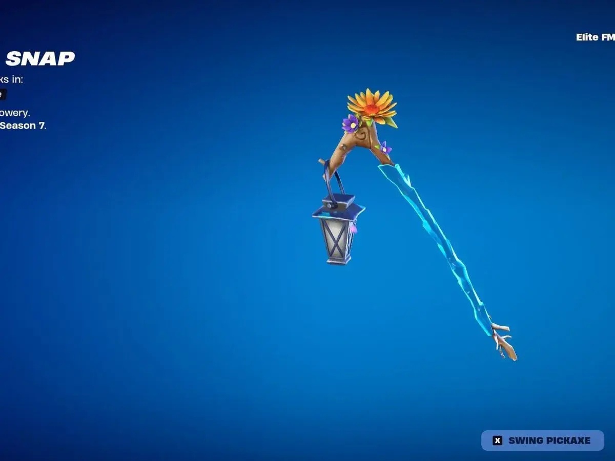 Słodziak Fortnite w postaci kilofa z latarenką i kwiatami.