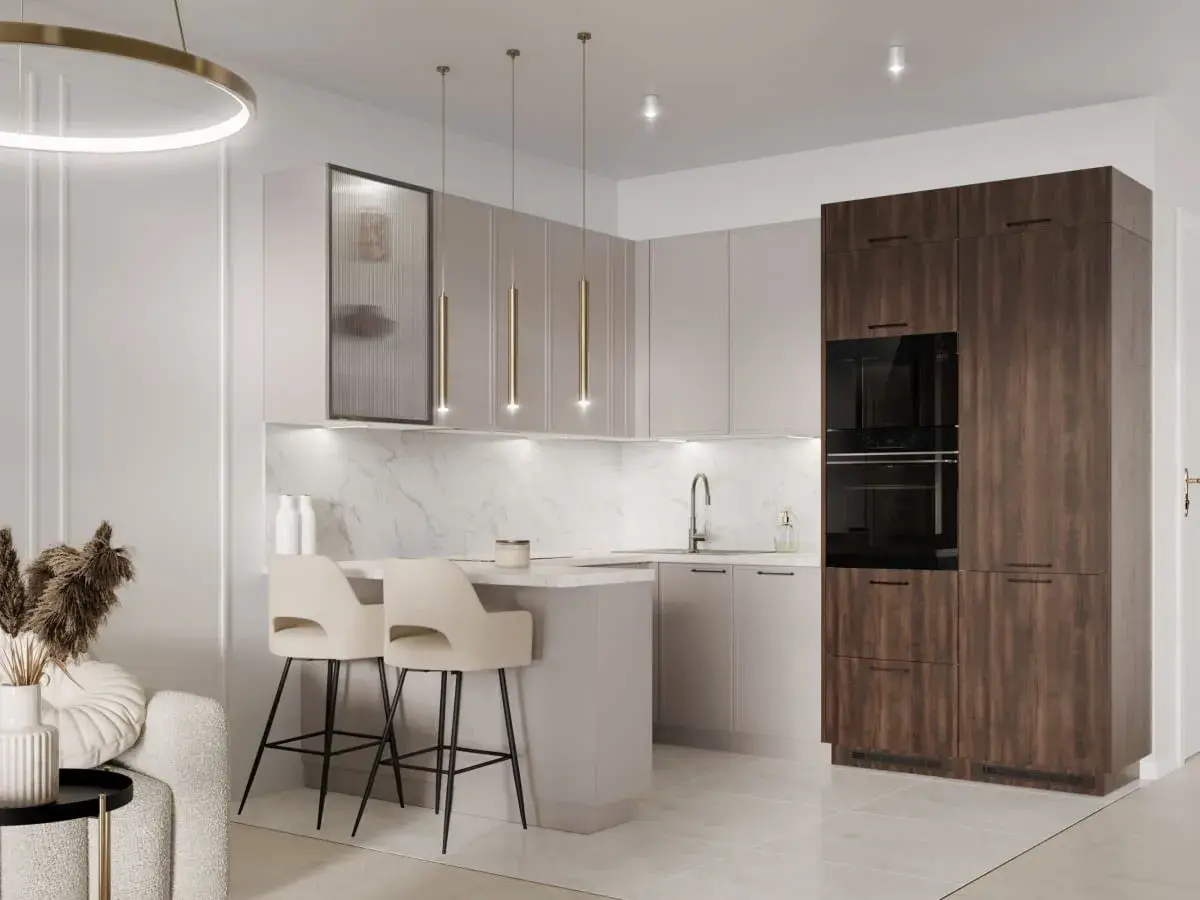 Elegancka kuchnia modern classic z wyspą, dwoma hokerami i wysoką zabudową z piekarnikami.