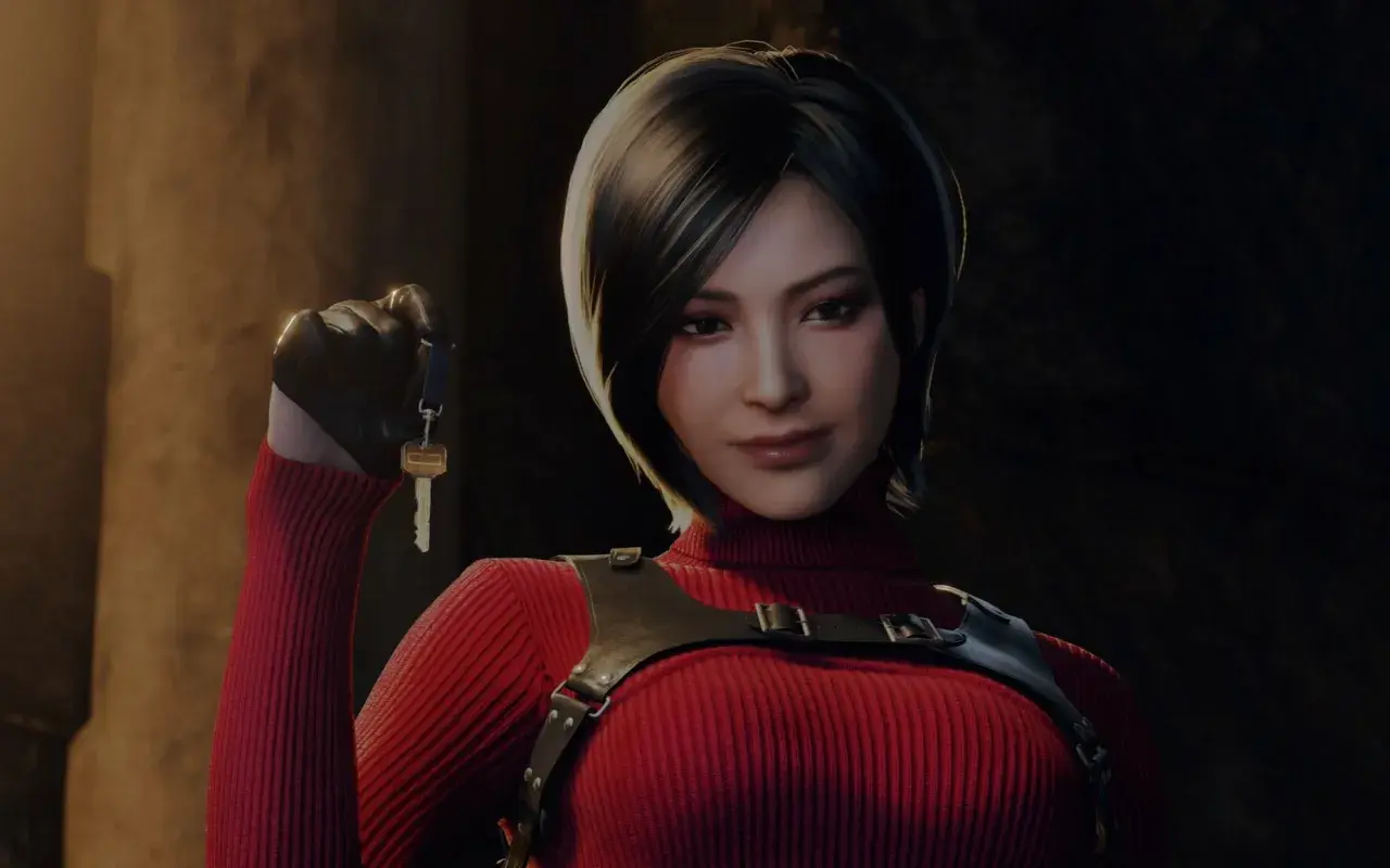 Ada Wong w czerwonym golfie i czarnych rękawiczkach trzyma klucz.