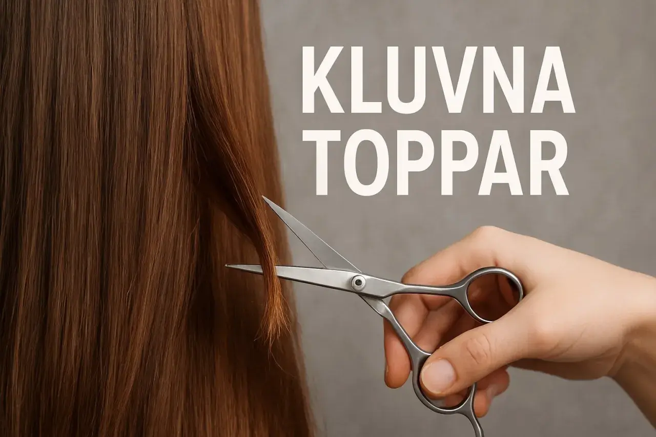 En hand klipper bort kluvna toppar från långt, brunt hår med en sax.