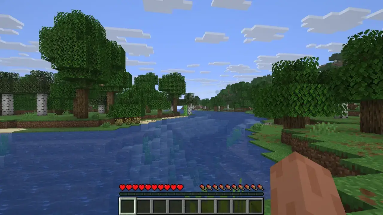 Piękny krajobraz w Minecraft, idealny na nowe przygody. Woda, drzewa i chmury tworzą wspaniałe seedy do Minecrafta.