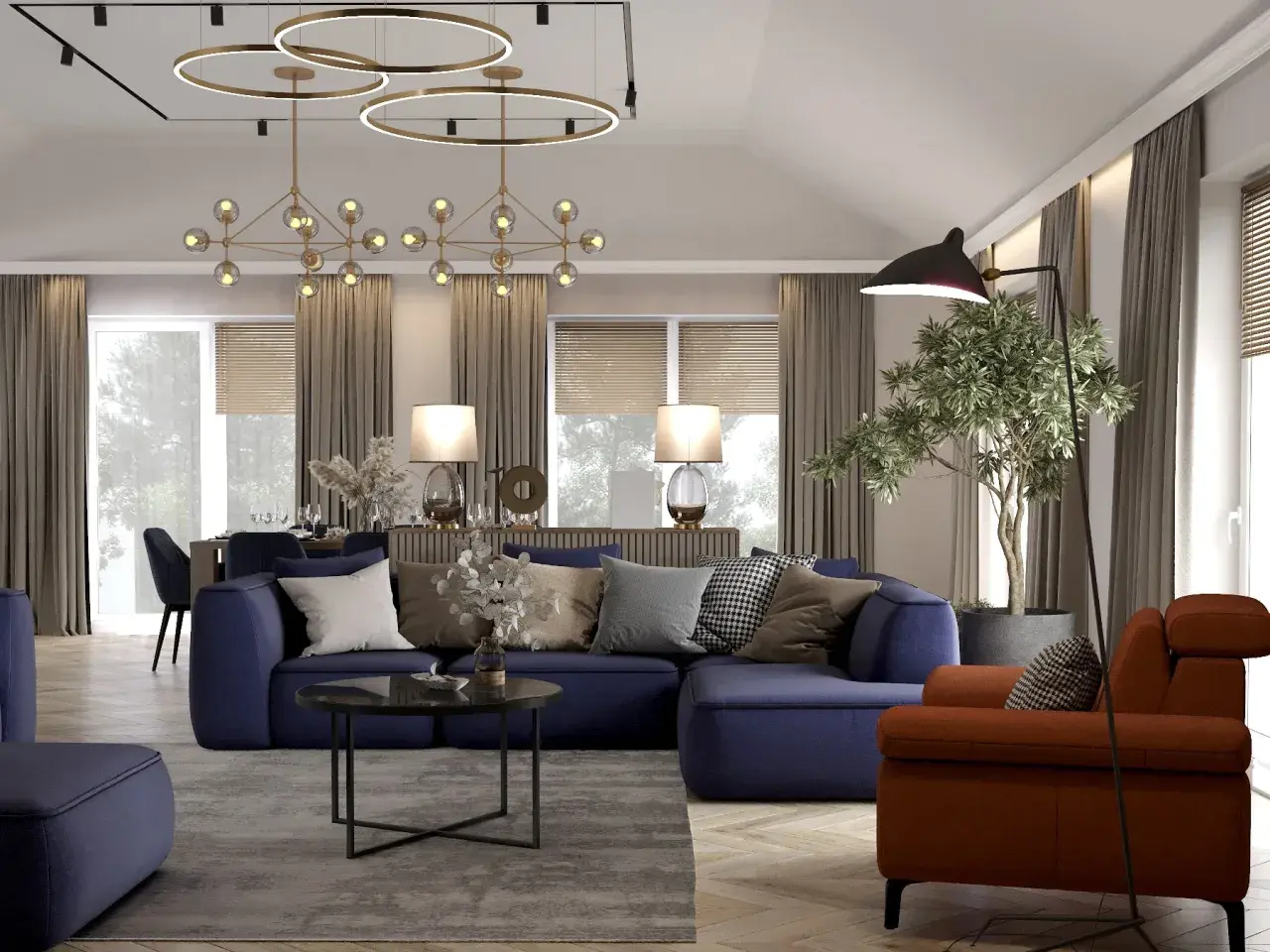 Nowoczesny salon z aneksem kuchennym 30m2 projekt: granatowa sofa, pomarańczowy fotel, designerskie lampy i jadalnia w tle.