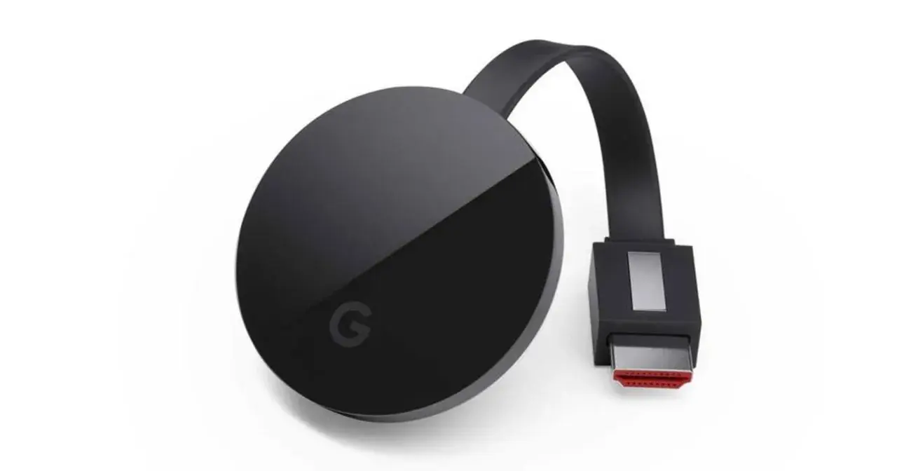 Czarny Chromecast z logo Google. Dowiedz się, jak połączyć się z chromecast, aby strumieniować treści.