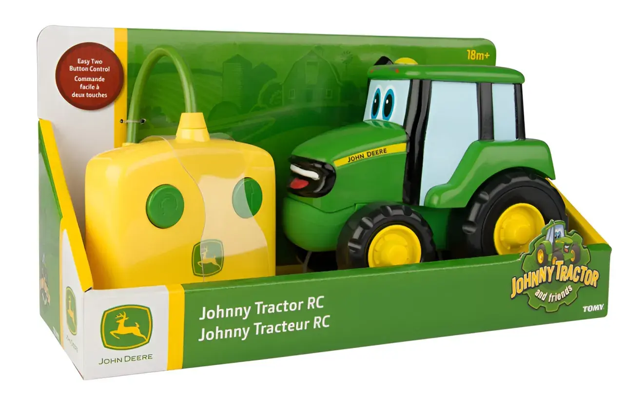 Zabawkowy traktor zdalnie sterowany Johnny Tractor RC, zielony, z żółtym pilotem. Idealny dla małych fanów maszyn rolniczych John Deere.
