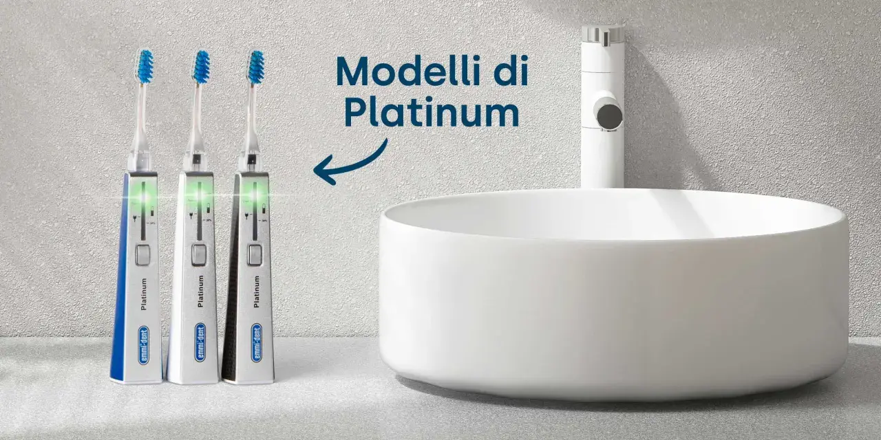 Tre spazzolini elettrici Platinum emmi-dent, con indicatori luminosi verdi, pronti per mostrare come si usa lo spazzolino elettrico.