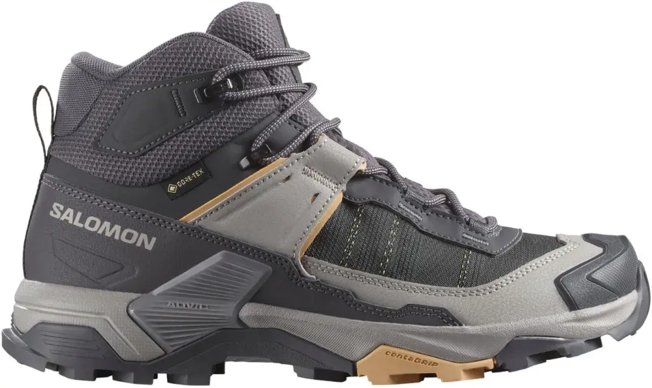 Szary, wysoki but trekkingowy Salomon X Ultra 5 Mid GTX z membraną Gore-Tex, idealny na górskie wędrówki.