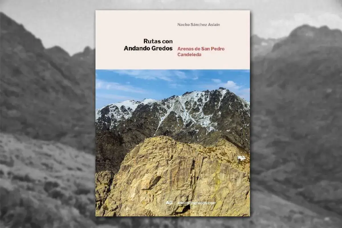 Libro "Rutas con Andando Gredos" sobre Arenas de San Pedro y Candeleda, con imagen de montañas nevadas.