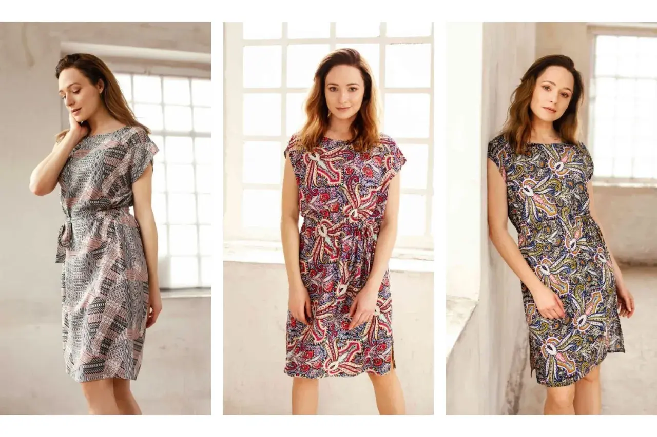 Trzy kobiety w sukienkach z wzorem paisley. Czy rayon oddycha? Tak, jest lekki i przewiewny, idealny na lato.