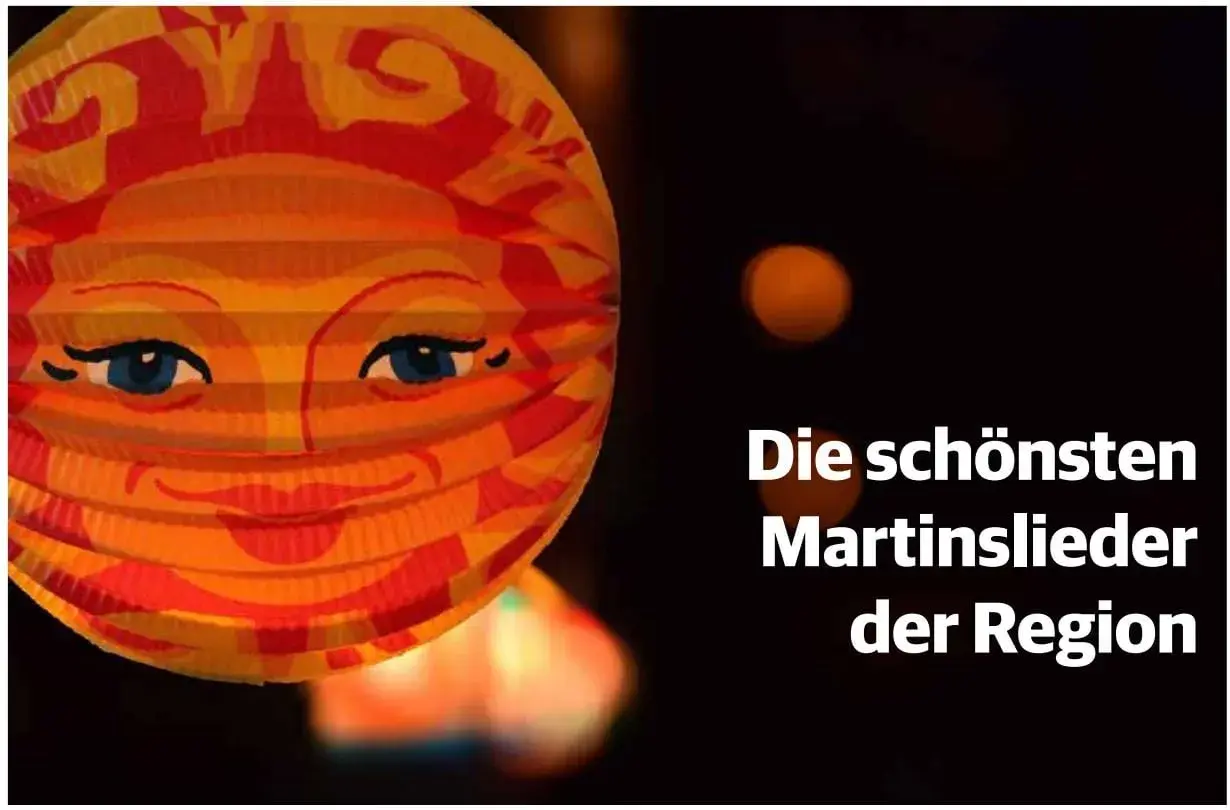Ein leuchtender Martinslaternen-Sonnenkopf mit Text: "Die schönsten Martinslieder der Region".
