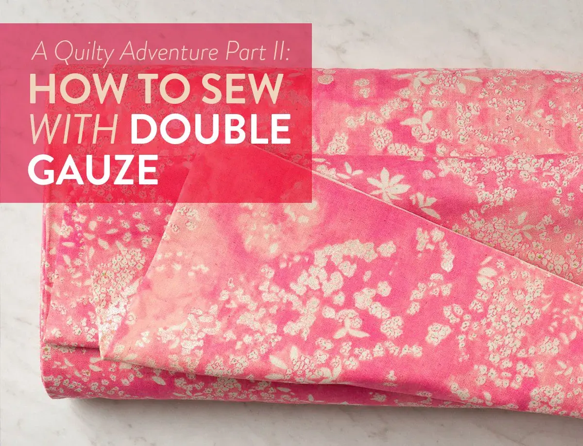 A pink floral double gaze de coton fabric is folded, with text overlaying the image.