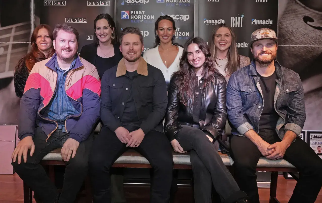 A group of musicians, including Alysa Vanderheym, pose for a photo at an event sponsored by SESAC, ASCAP, BMI, and Pinnacle Financial Partners.