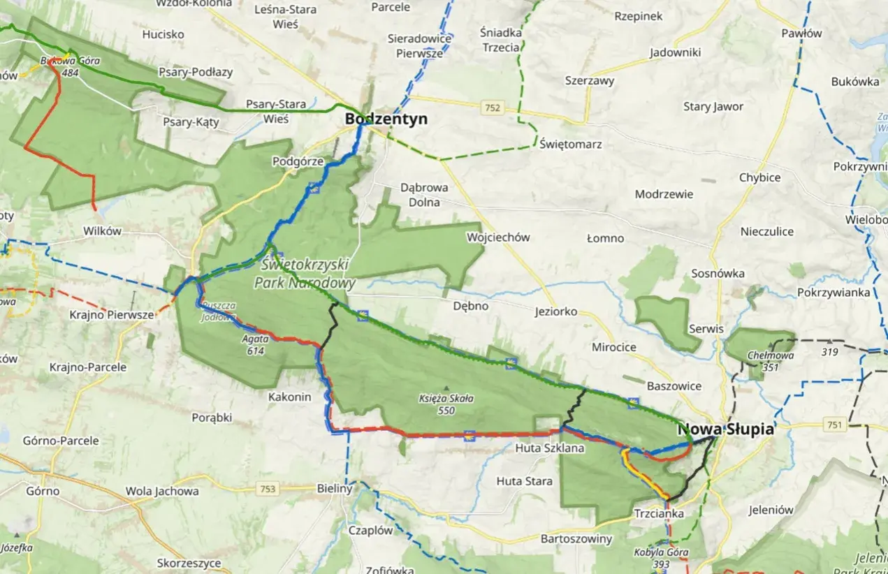 Mapa turystyczna z zaznaczonymi szlakami w Świętokrzyskim Parku Narodowym. Atrakcje przyrodnicze i punkty widokowe.