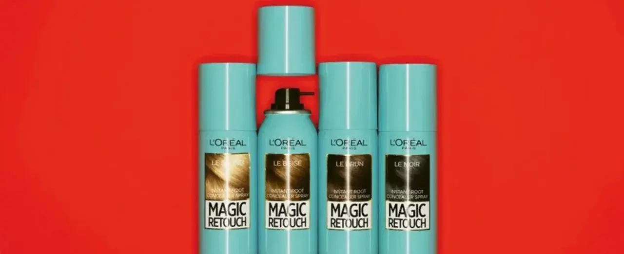 Latas de L'Oréal Magic Retouch, spray para raíces. Considera las contraindicaciones antes de usar.