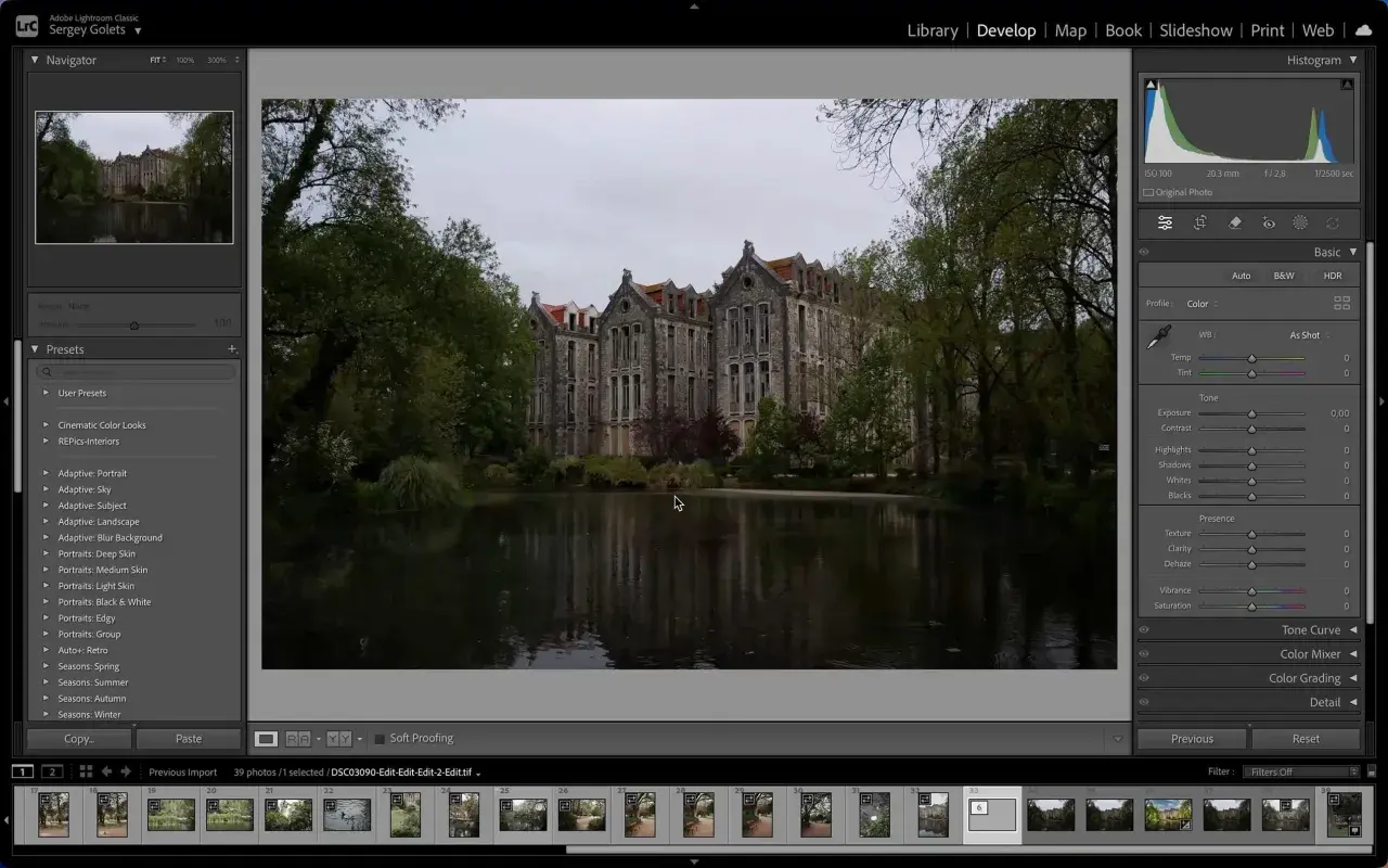 Edycja zdjęcia w Lightroom Classic, z widocznym budynkiem i jeziorem. Panel po prawej pokazuje narzędzia do color grading, w tym suwaki ekspozycji i balansu bieli.