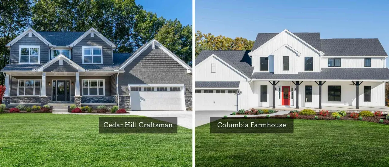 A dark gray craftsman house with stone accents stands next to a bright white modern farmhouse with a red door.