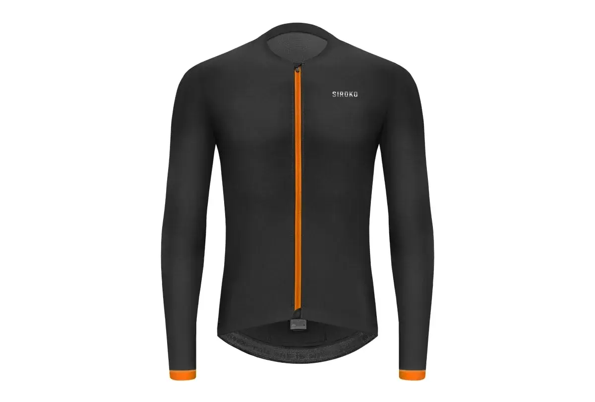 Czarny longsleeve rowerowy z pomarańczowym zamkiem i detalami.