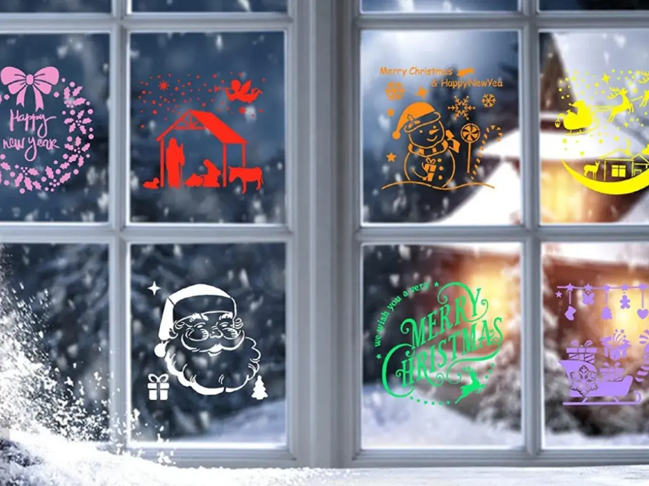 Un dibujo de ventana de Navidad con pegatinas de Santa, muñeco de nieve, belén y renos.