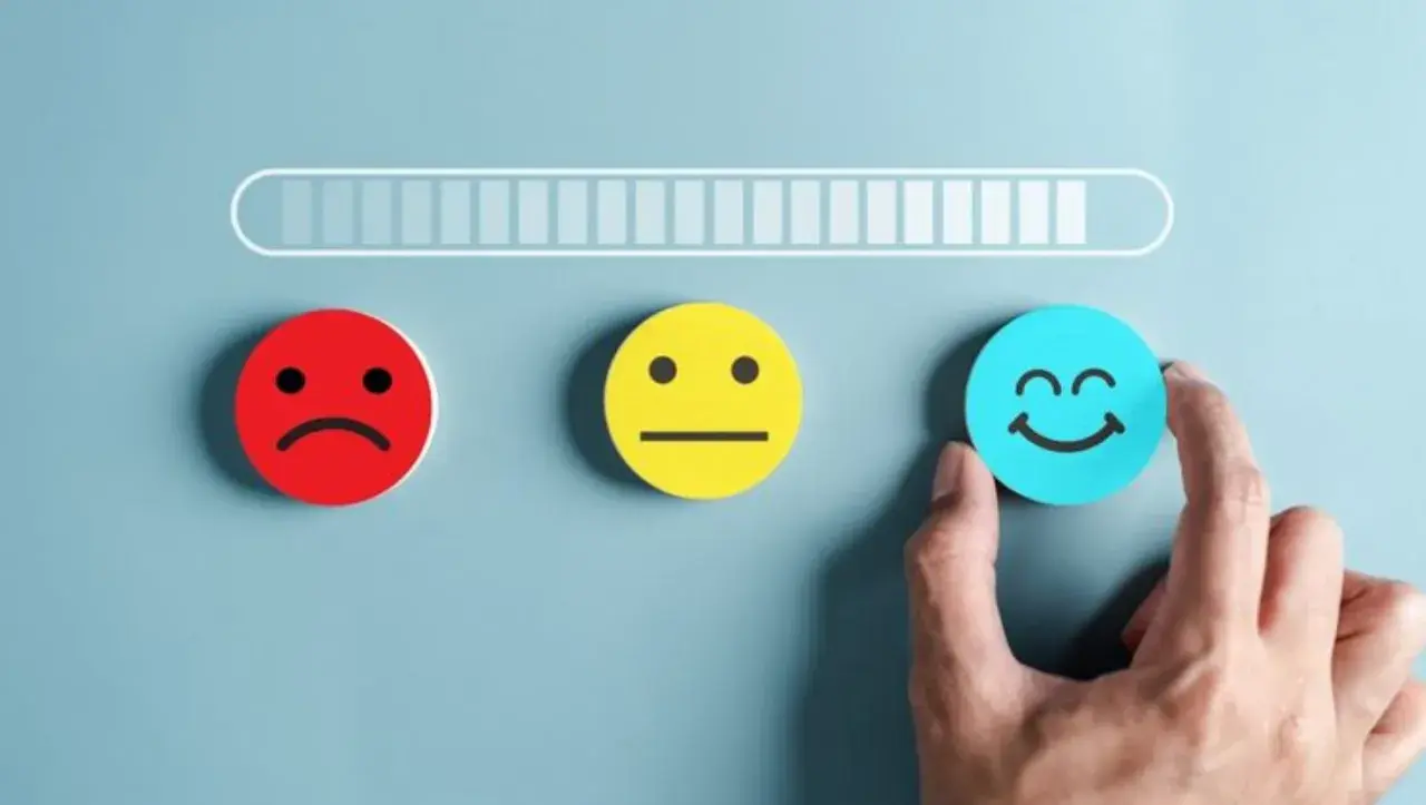 Progresso verso la felicità: un'icona sorridente, che simboleggia la dopamina, cos'è e come raggiungerla.
