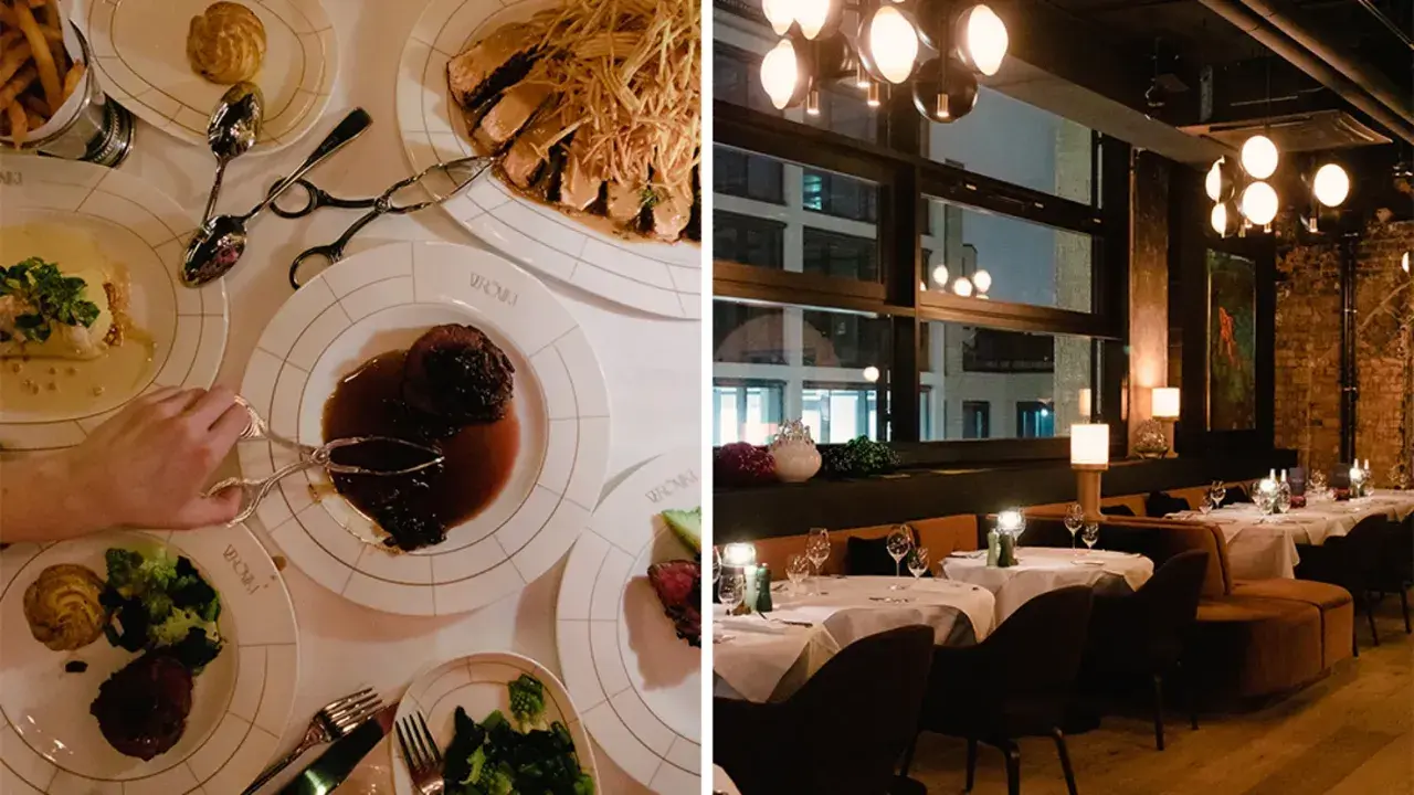 Ein festliches Abendessen in einem Berliner Restaurant Geheimtipp. Aufgetischte Speisen und ein stilvolles Ambiente mit Blick auf die Stadt.