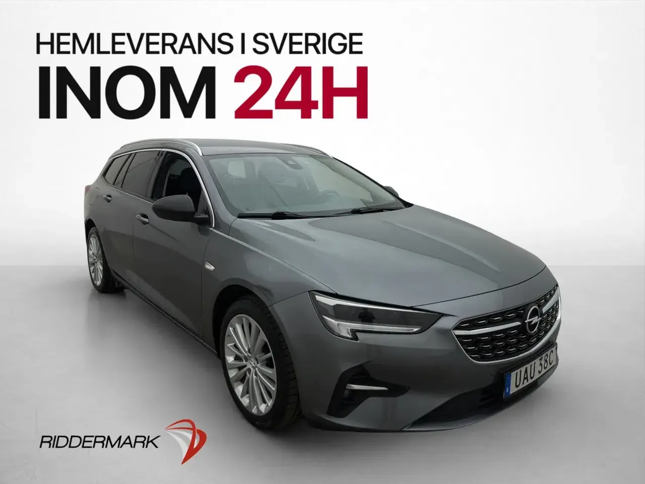 Grå Opel kombi, en av många Opel modeller, redo för hemleverans i Sverige inom 24 timmar.