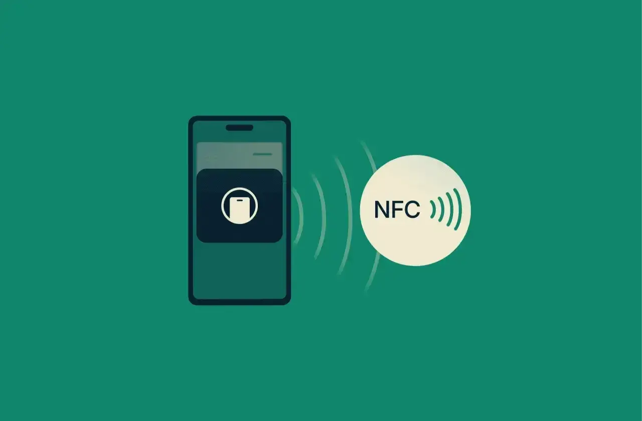 Telefon z ikoną płatności zbliżeniowych i symbolem NFC, gotowy do szybkiego transferu danych.