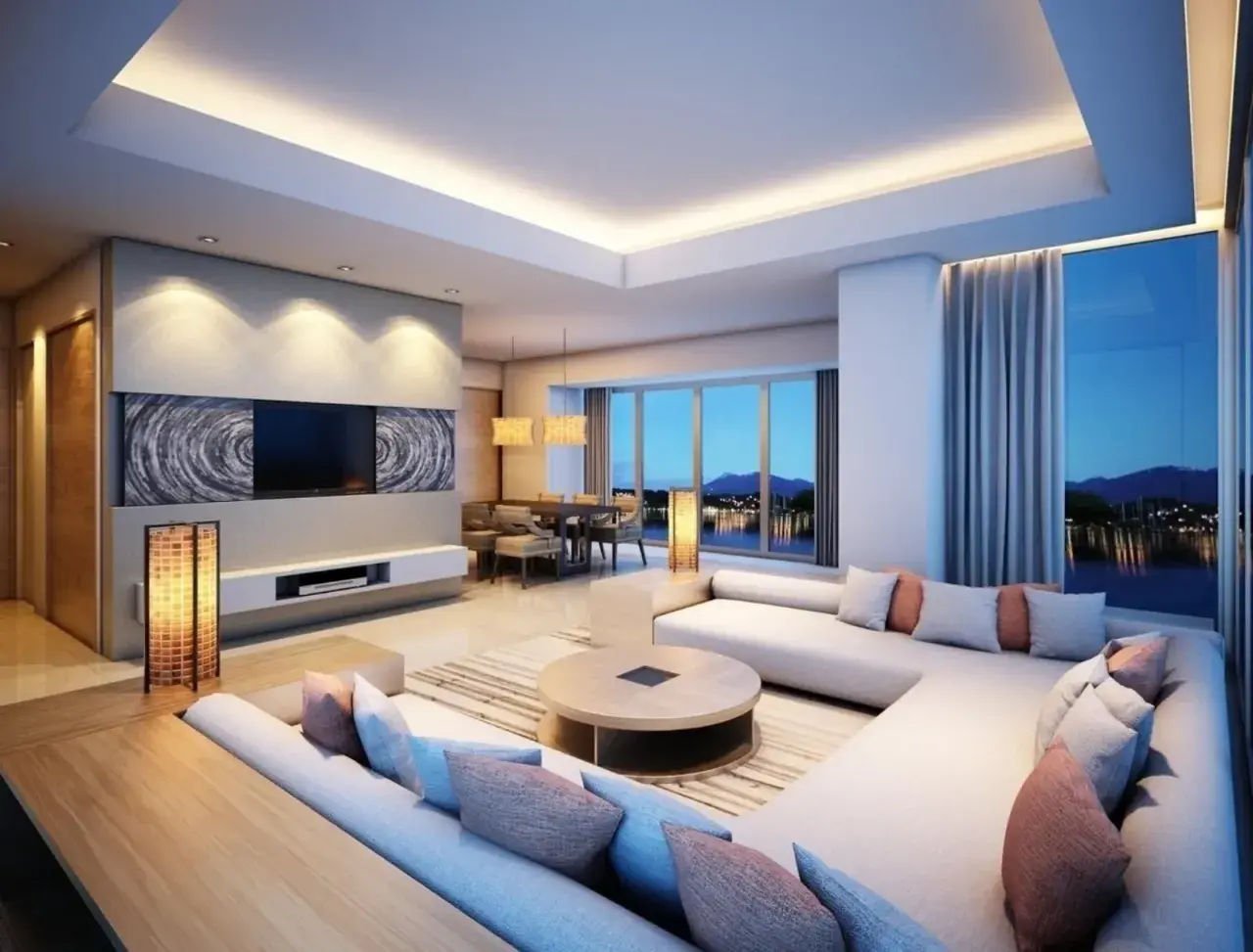 Elegante soggiorno con soffitto a cassettone in cartongesso, illuminazione indiretta e vista panoramica. La struttura cartongesso valorizza l'ambiente.