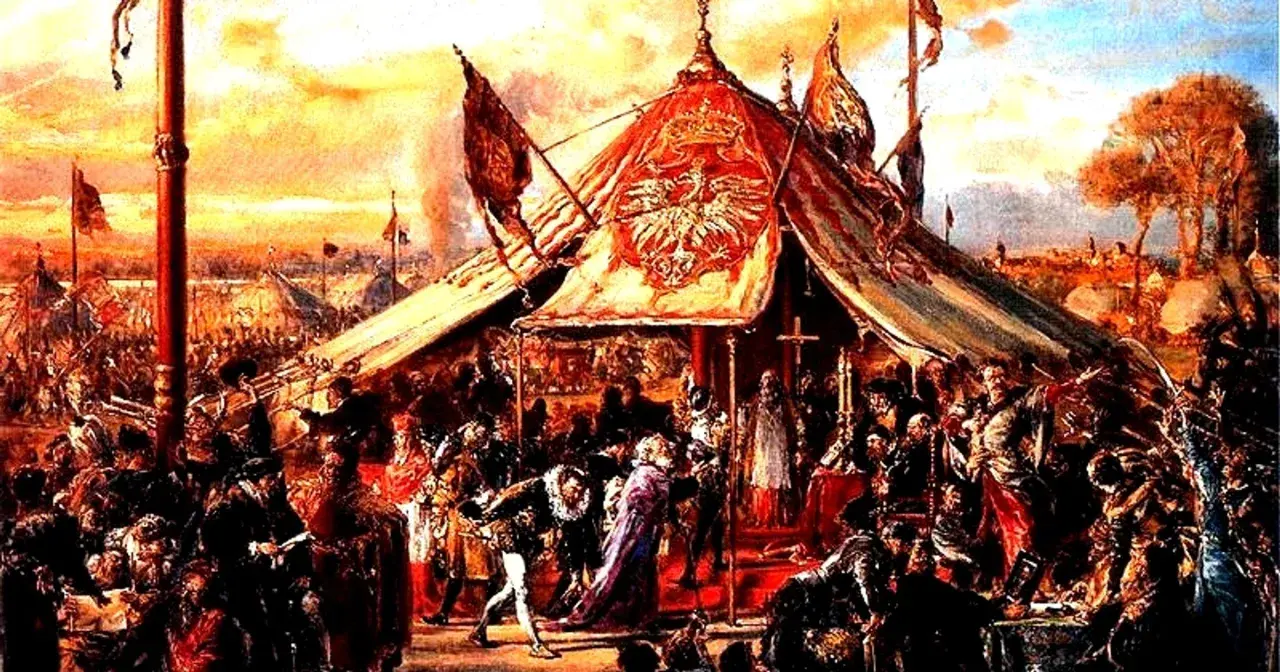 Scena historyczna z namiotem i szlachtą. W tle sztandary, symbolizujące wolność i prawo do liberum veto.