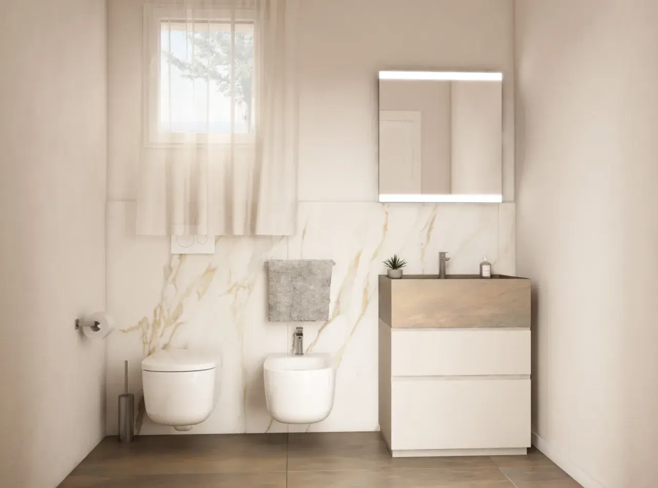 Bagno moderno con WC, bidet e mobile lavabo. Ideale per chi cerca ispirazione su come posare piastrelle bagno con finiture marmorizzate.