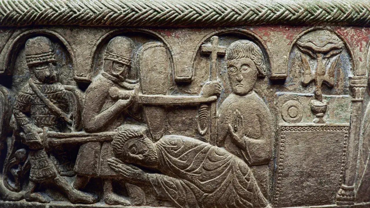 Stenrelief med en scen som påminner om martyriet av **Saint Sebastian**. Soldater förbereder sig, en man ligger ner, och en annan håller ett kors.