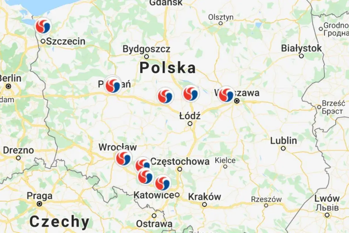 Mapa Polski z zaznaczonymi punktami. Widać autostradę A4, a także lokalizacje miast takich jak Katowice i Kraków, sugerujące opłaty.