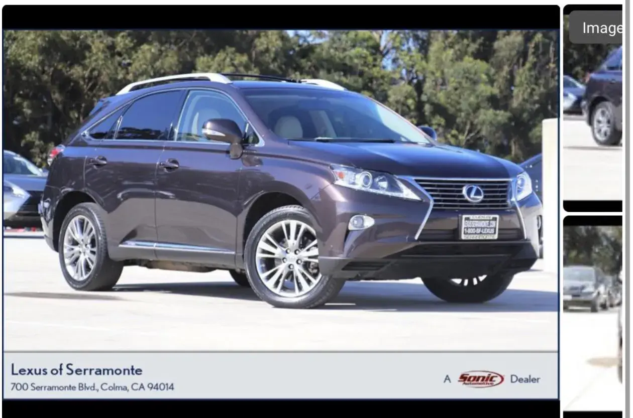 Mörkbrun Lexus RX 450h, en SUV med takräcken. Kanske ett lexus rx 450h problem som behöver åtgärdas?