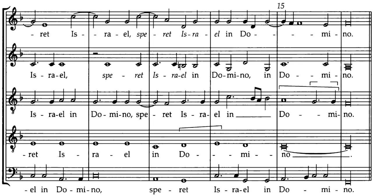 Extrait de partition musicale montrant un exemple de polyphonie vocale avec les paroles "Israel in Domino".