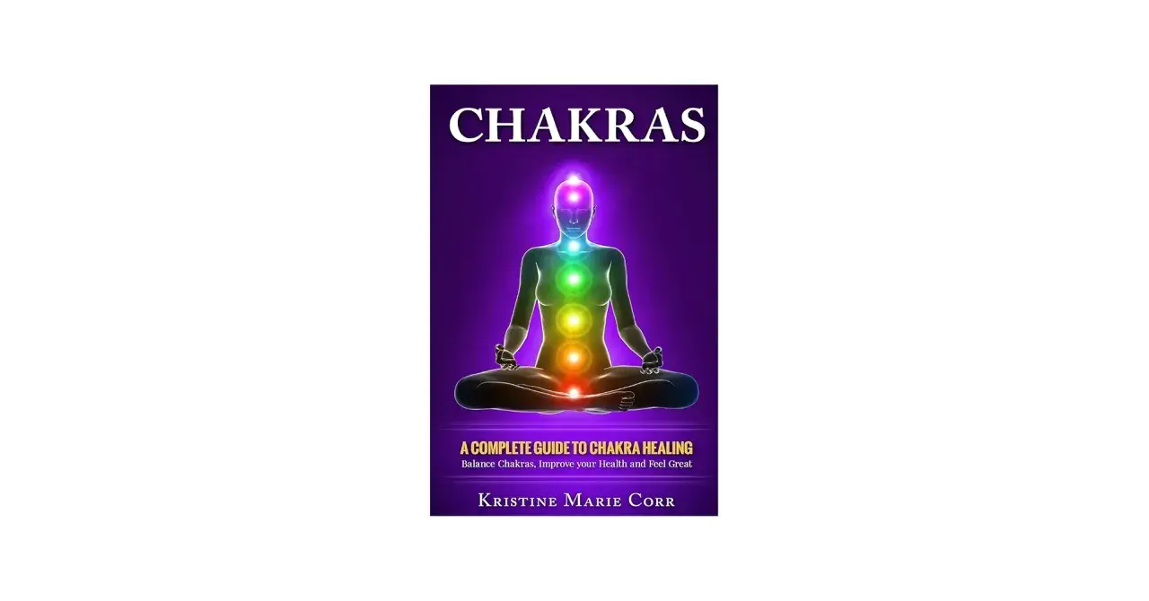 Okładka książki "Chakras" z sylwetką w pozie medytacyjnej i kolorowymi czakrami.