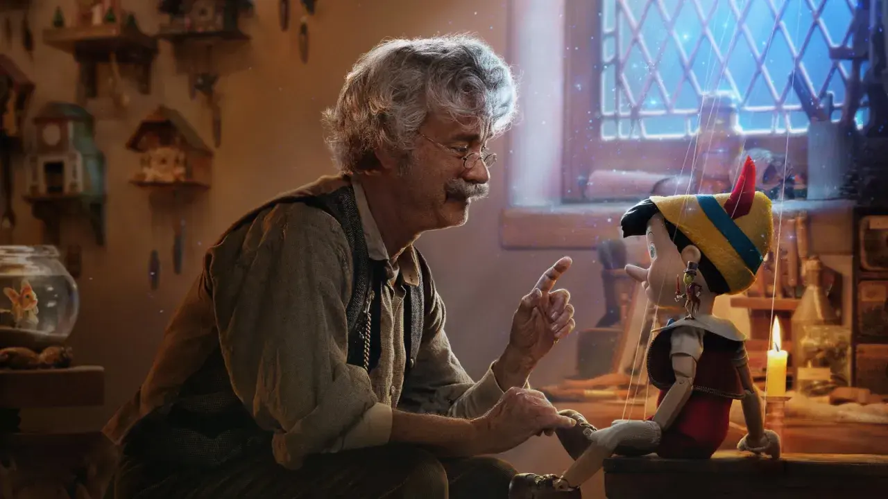 Gepetto pratar med Pinocchio, en docka som ser ut att vara från klassiska familjefilmer. En magisk stämning med gnistrande ljus.