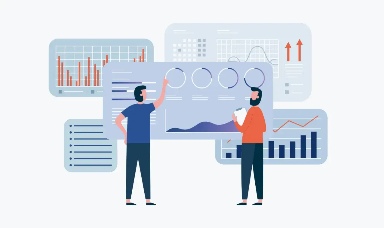 Due persone analizzano grafici e dati, un esempio di hr analytics per prendere decisioni strategiche.