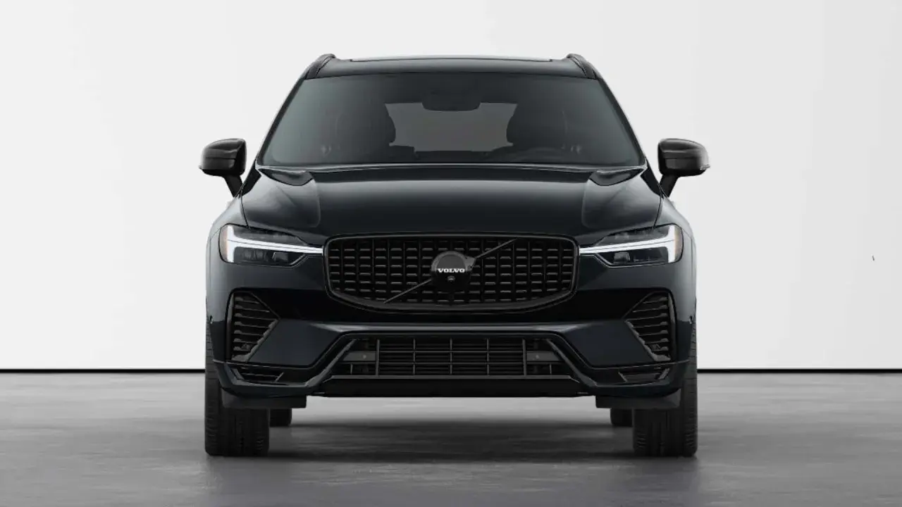 Elegancki, czarny Volvo XC60 Black Edition z charakterystycznym grillem i światłami LED.