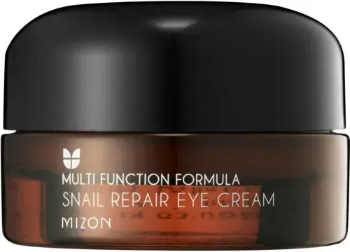 En Mizon Snail Repair Eye Cream-burk. Denna ögonkräm med snigelslem lyko är en del av en multifunktionell formula för huden.