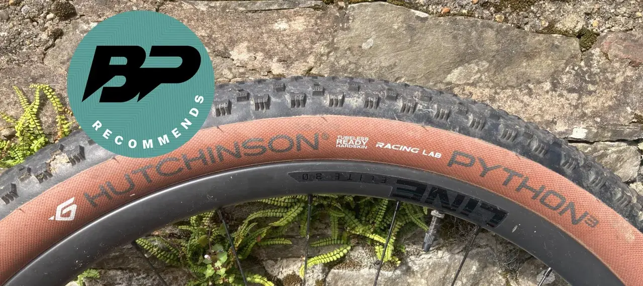 Close-up of a Hutchinson Python tire on a bike wheel, with a "BP Recommends" logo.