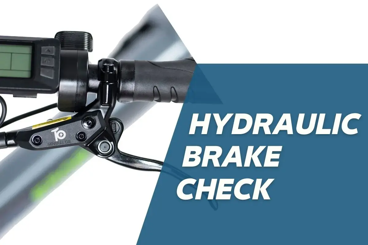 Close-up of an e-bike's hydraulic brake lever and display. Learn about old brake fluid symptoms and how to check your brakes.