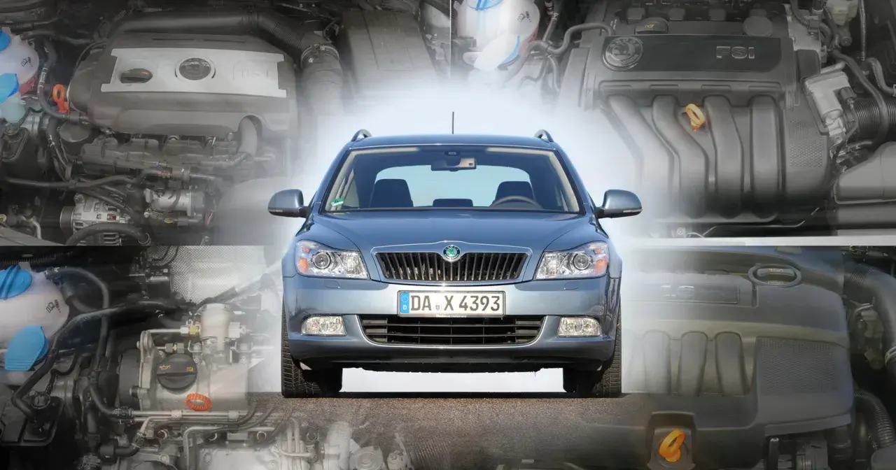 Szara Skoda Octavia 2 na tle silników.