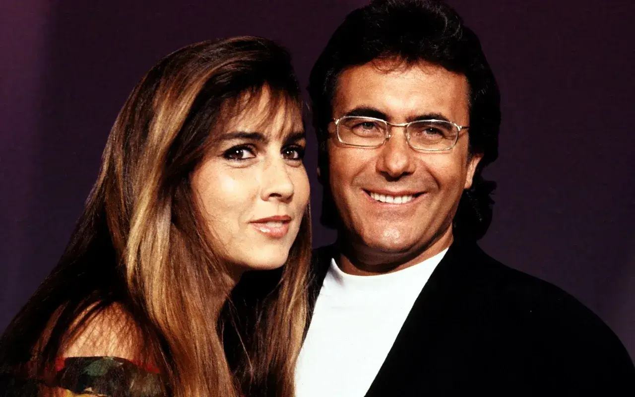 Para Al Bano i Romina Power, uśmiechnięci, emanują szczęściem. Ich wspólna **felicita po polsku tekst** to historia miłości i muzyki.