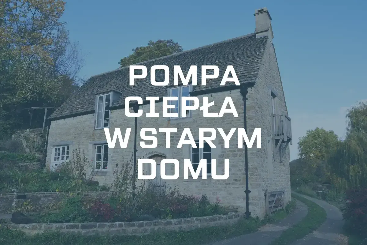 Pompa ciepła w starym domu z kamienia, otoczonym zielenią. Nowoczesne ogrzewanie w zabytkowej architekturze.