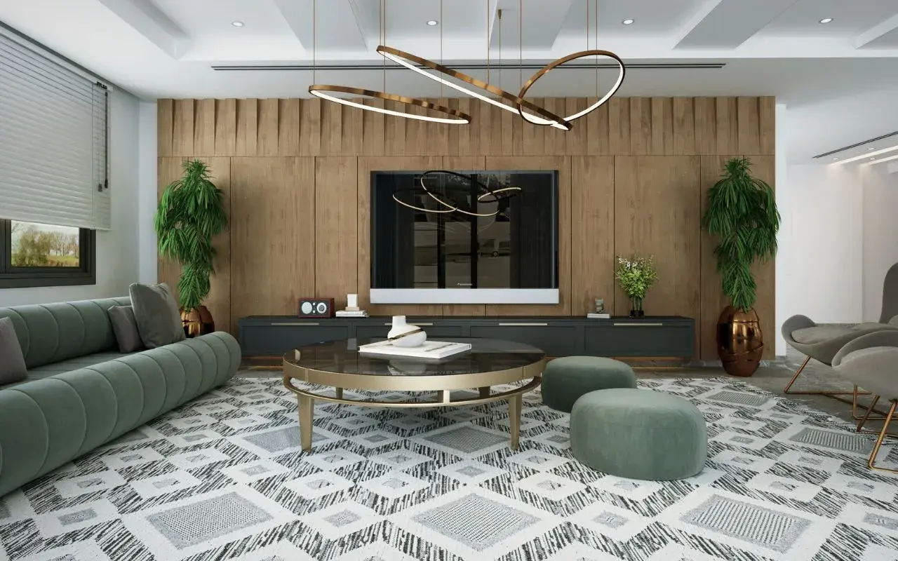 Un salon moderne avec un canapé vert, une table basse ronde et un tapis graphique. L'éclairage du salon est assuré par un lustre sculptural et des spots intégrés, créant une ambiance chaleureuse.