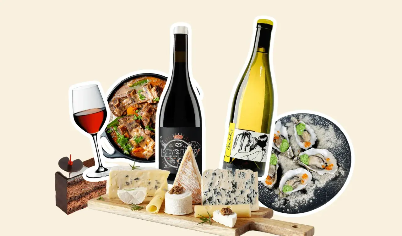 Un festin pour les sens : vin, fromages, huîtres, plat mijoté et gâteau au chocolat pour un moment de pur plaisir.